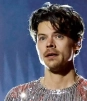 Harry Styles sorprende en Glastonbury al besarse con una mujer misteriosa